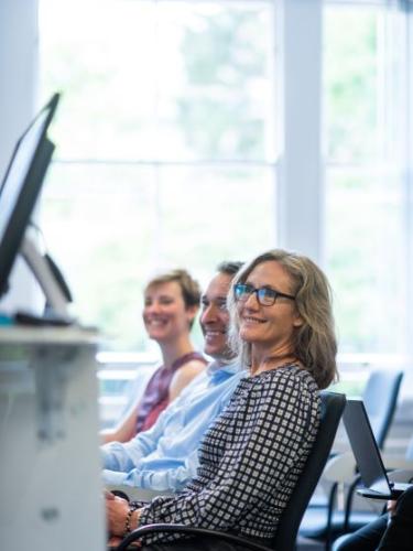 DSPI doctoral students in a lecture room