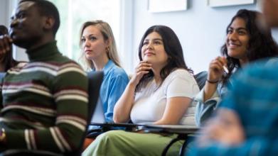 DSPI doctoral students in a lecture room