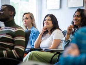 DSPI doctoral students in a lecture room