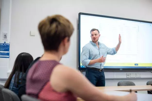 DSPI doctorate students in a lecture room