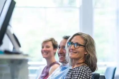 DSPI doctoral students in a lecture room