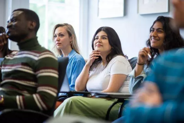 DSPI doctoral students in a lecture room