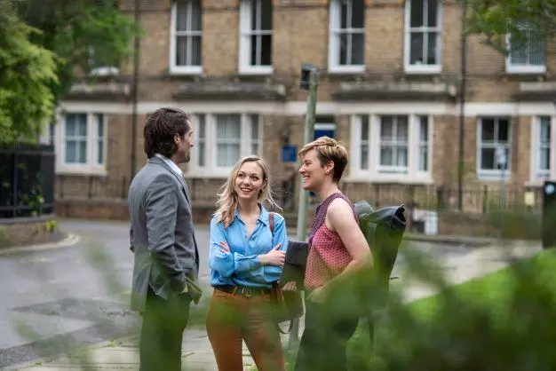 DSPI students in the street chatting outside Barnett House
